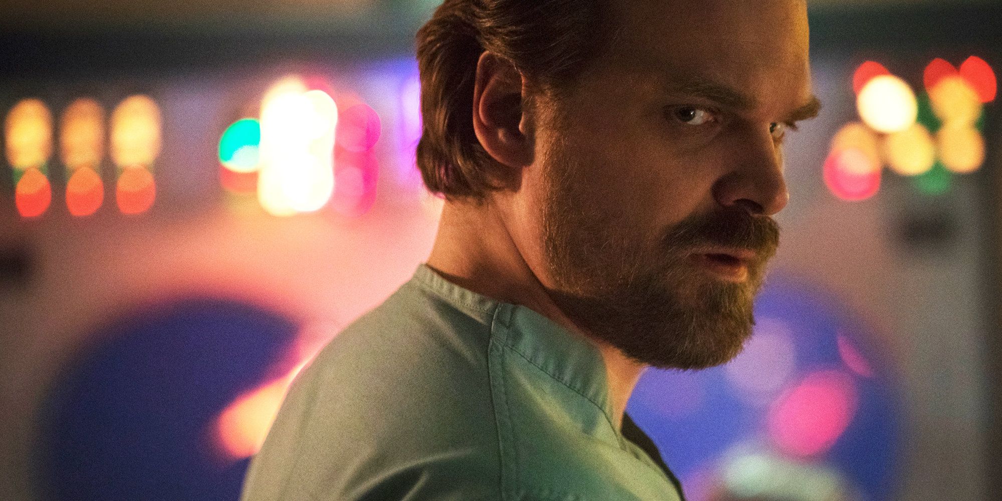 David Harbour as Hopper looking on with hesitation
