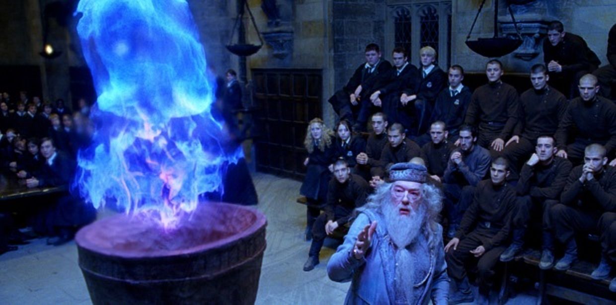 Dumbledore standing below the Goblet of Fire