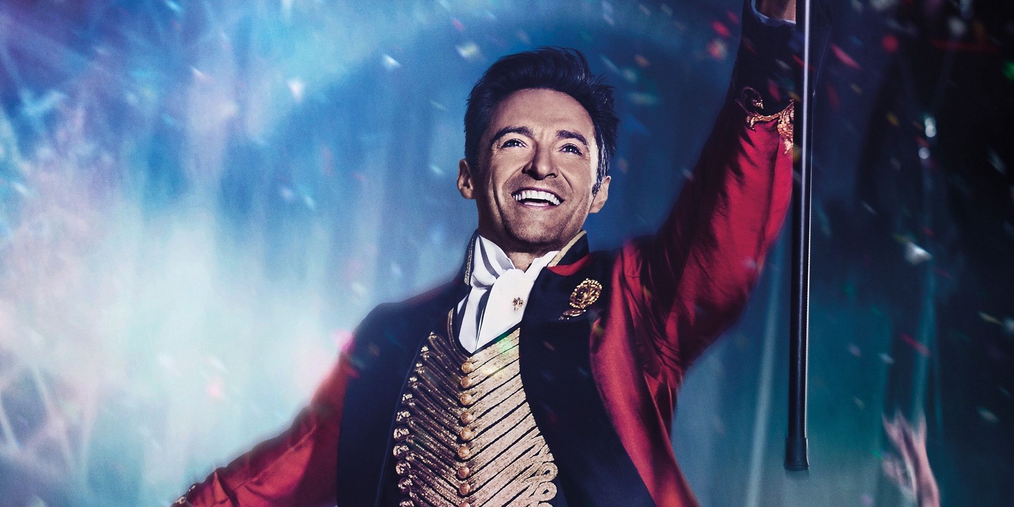 Hugh Jackman in his red coat as PT Barnum in The Greatest Showman poster