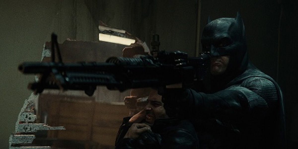 Ben Affleck as Batman with a gun in Batman V Superman: Dawn of Justice