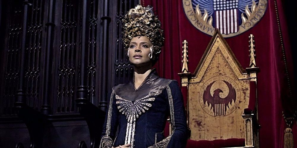 Carmen Ejogo looks out from a throne