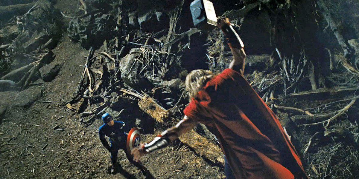 Thor swinging Mjolnir at Captain America