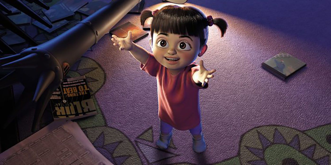 Boo reaches out for a hug in Mike and Sully's apartment 