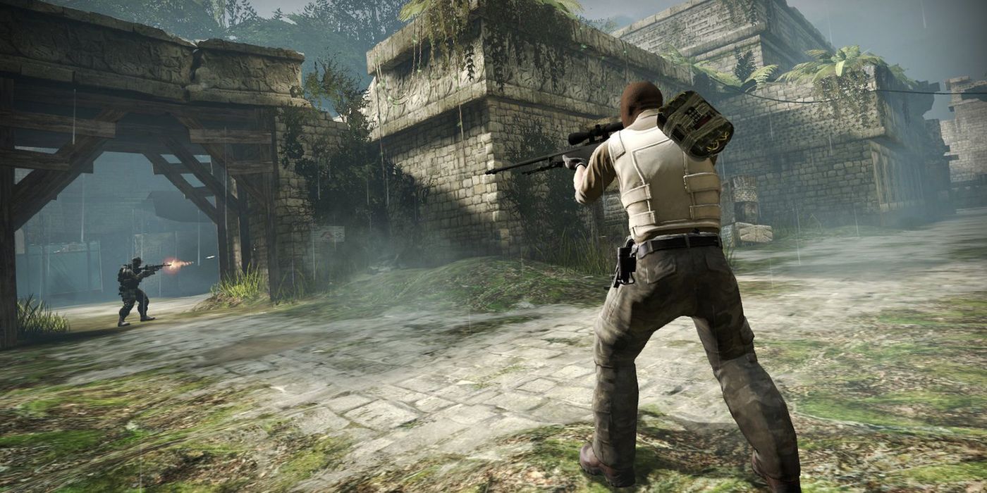 Two players fire at one another in Counter-Strike Global Offensive 
