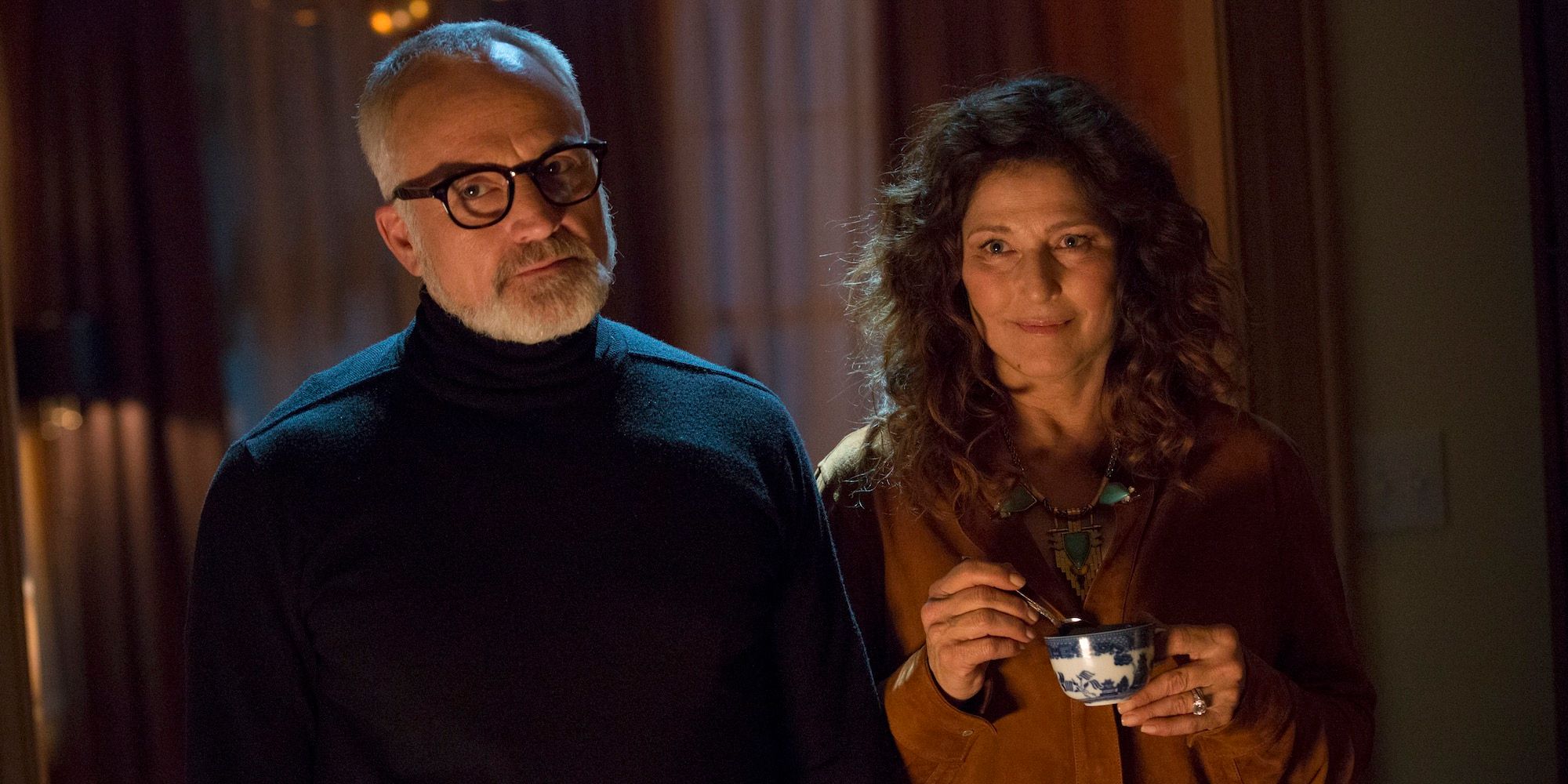 Bradley Whitford and Catherine Keener in a dark room in Get Out