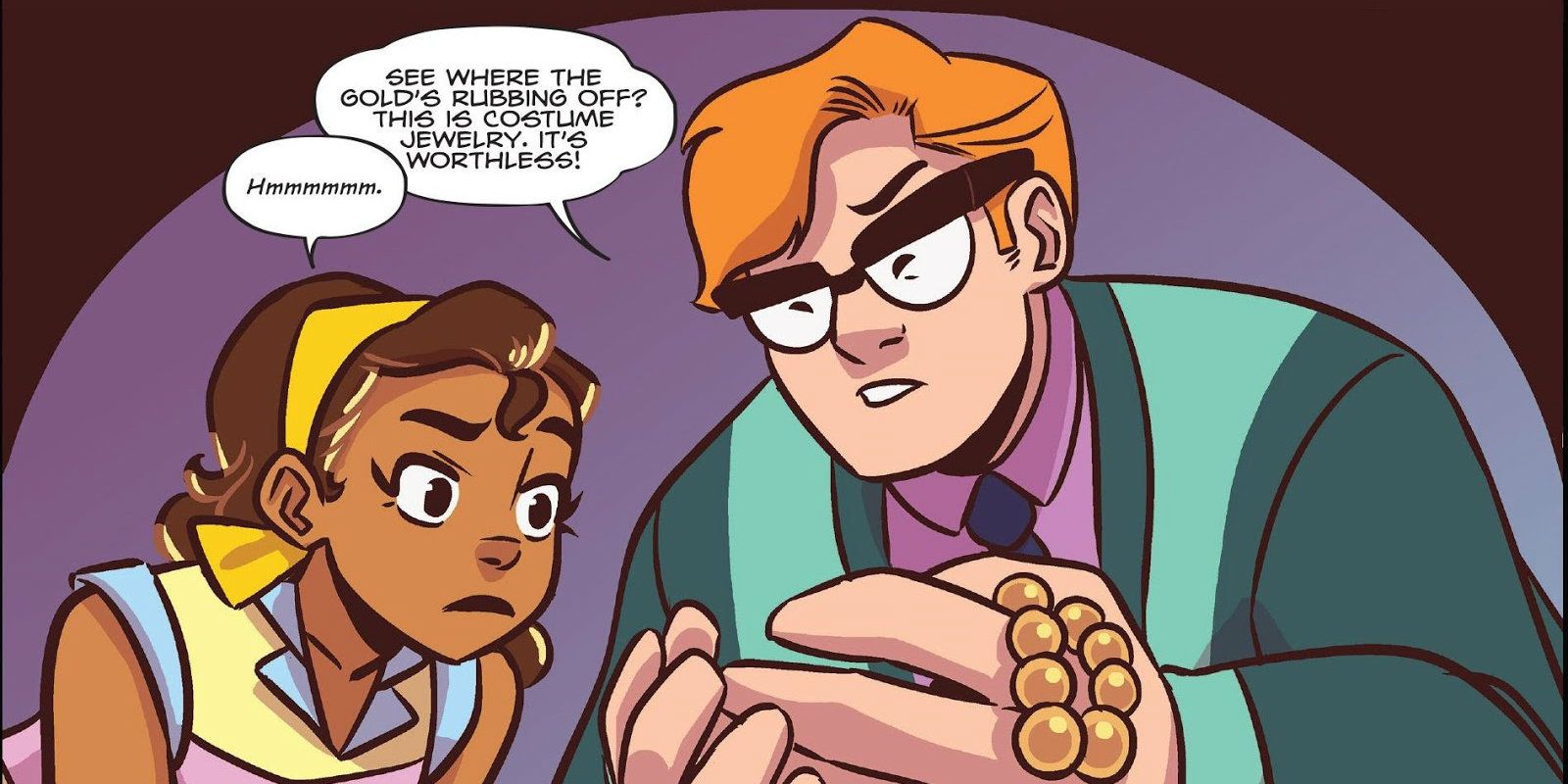 Goldie Vance looking at a necklace with her friend