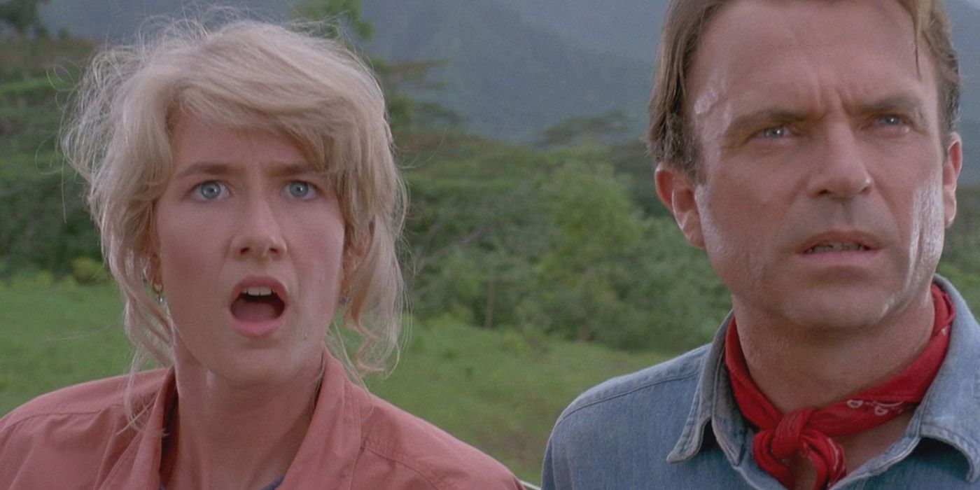 Laura Dern and Sam Neill looking shocked in Jurassic Park