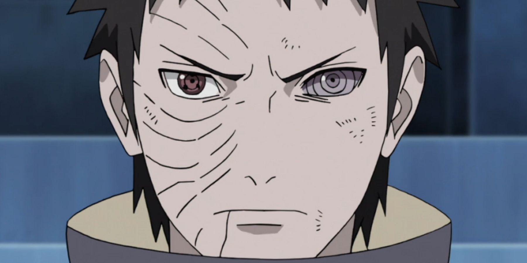 Obito Uchiha stares menacingly ahead in Naruto Shippuden