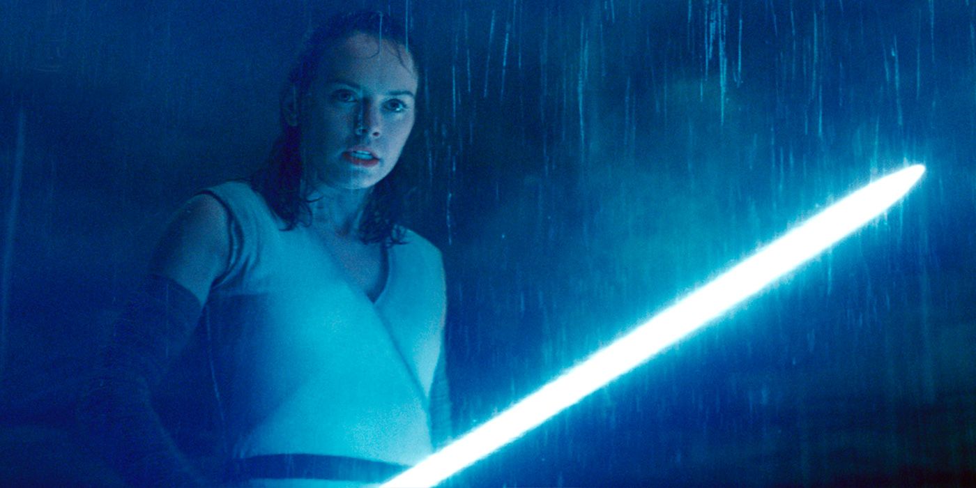 Rey with the lightsaber in Star Wars The Last Jedi