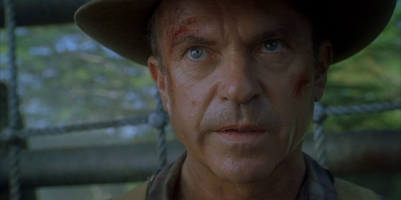 Dr. Alan Grant in his hat next to the remnants of an enclosure in Jurassic Park 3