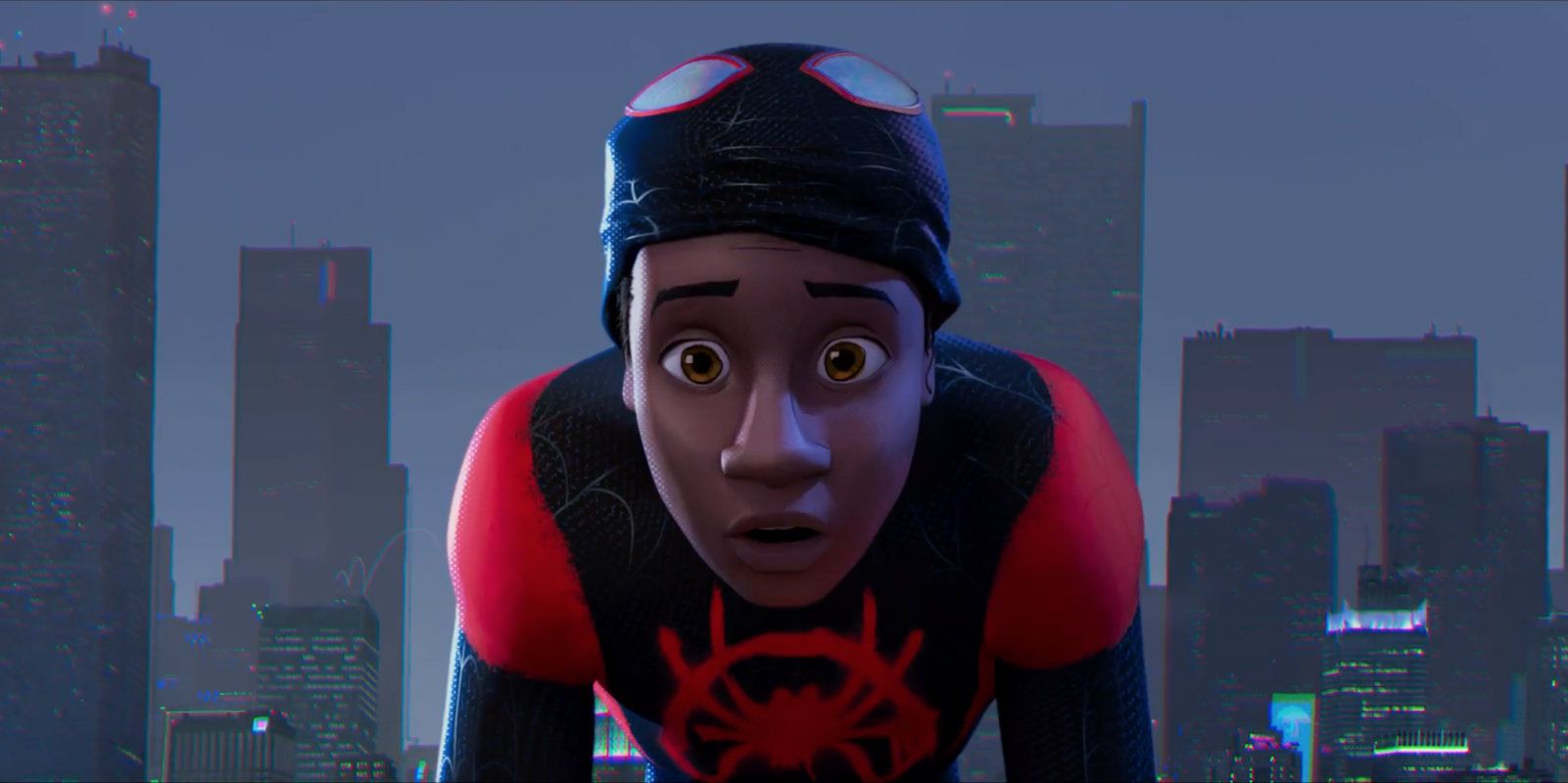 Miles Morales lifts up his mask in Into The Spider-Verse