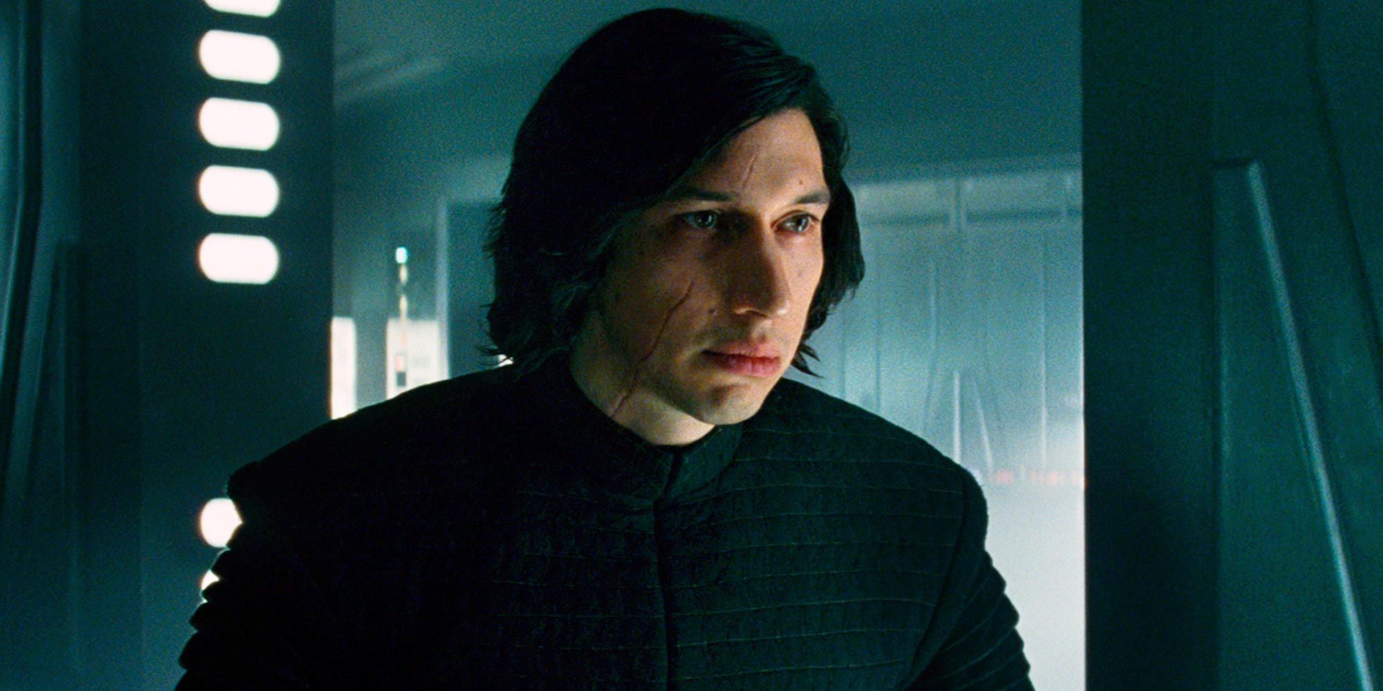 Adam Driver frowning as Kylo Ren in Star Wars The Last Jedi 