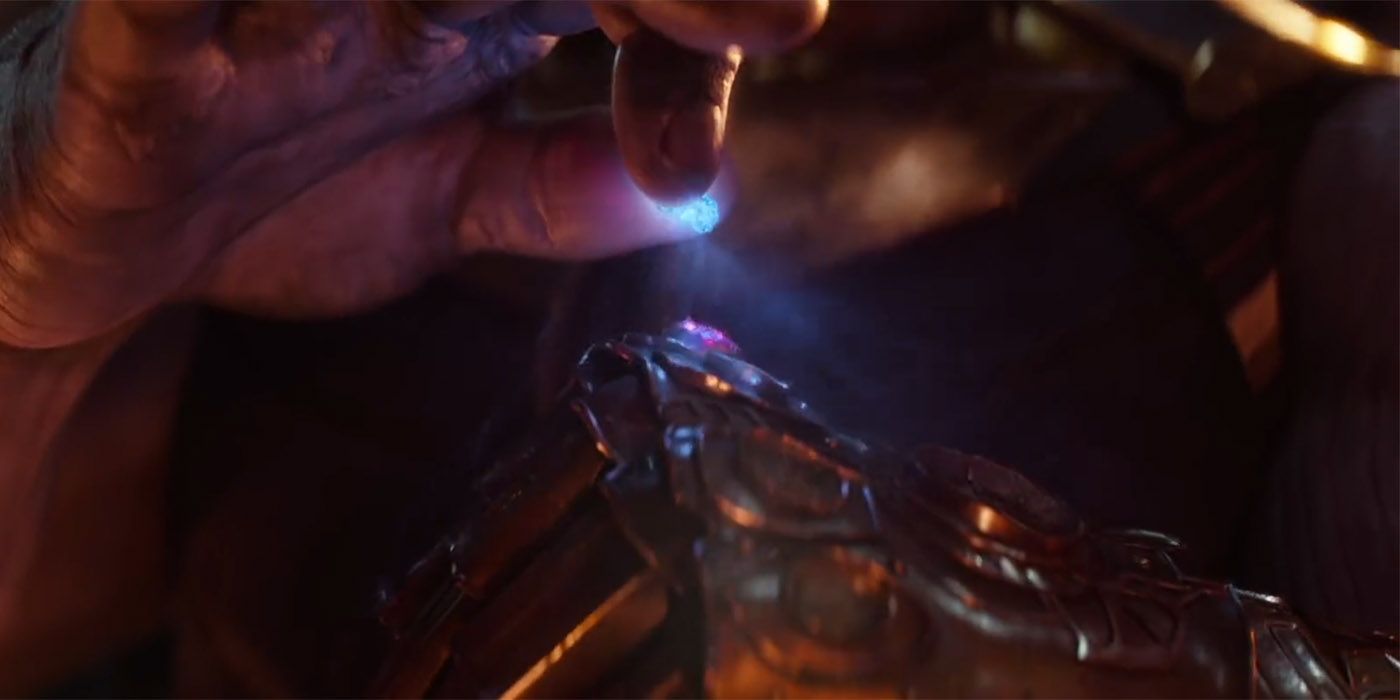 Thanos adds the Space Stone to the Infinity Gauntlet in Avengers Infinity War