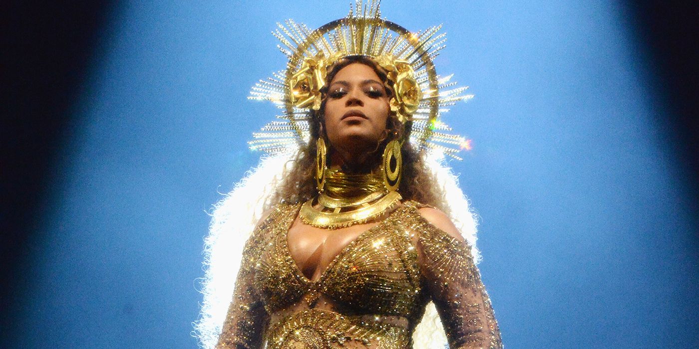 Beyoncé in gold sparkle outfit