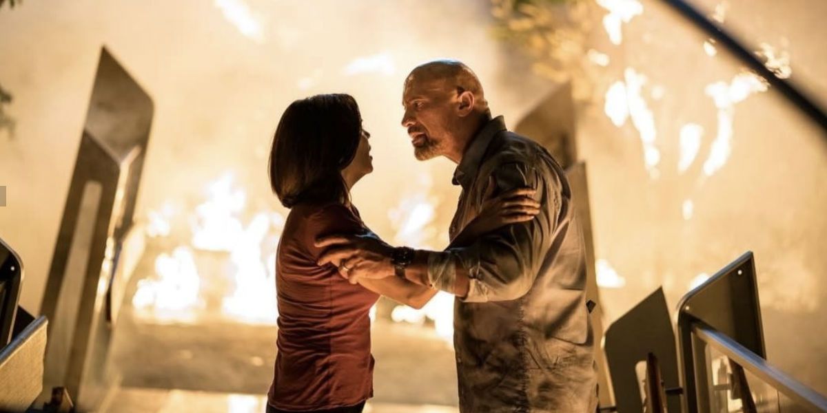 Neve Campbell and Dwayne Johnson in Skyscraper