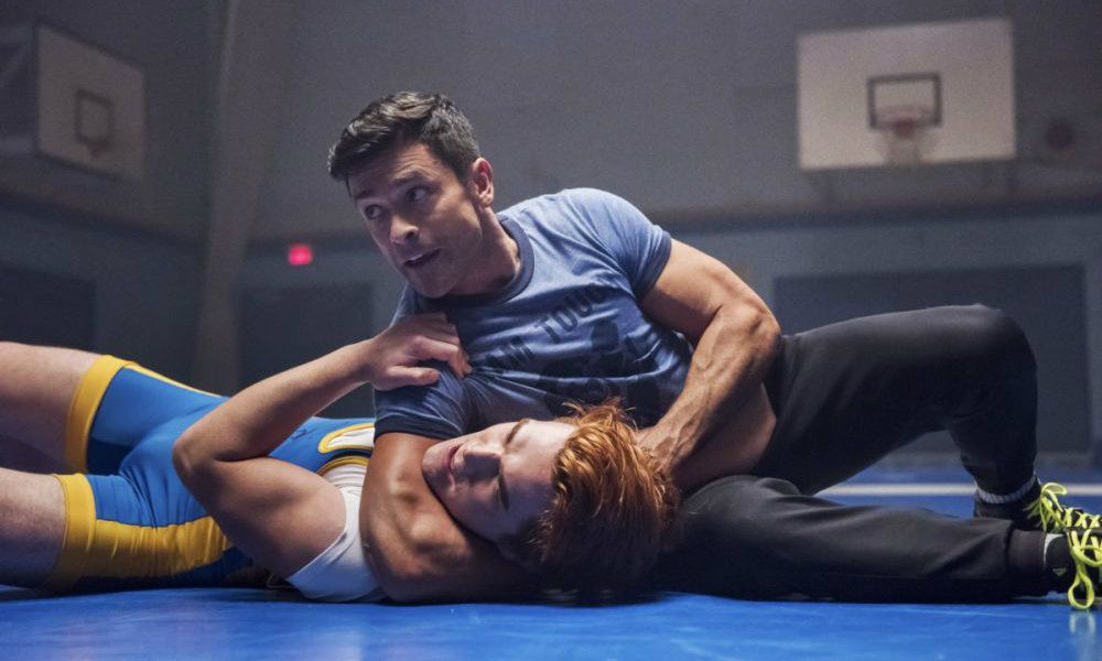 Archie and Hiram wrestling in Riverdale High gym in the episode The Wrestler