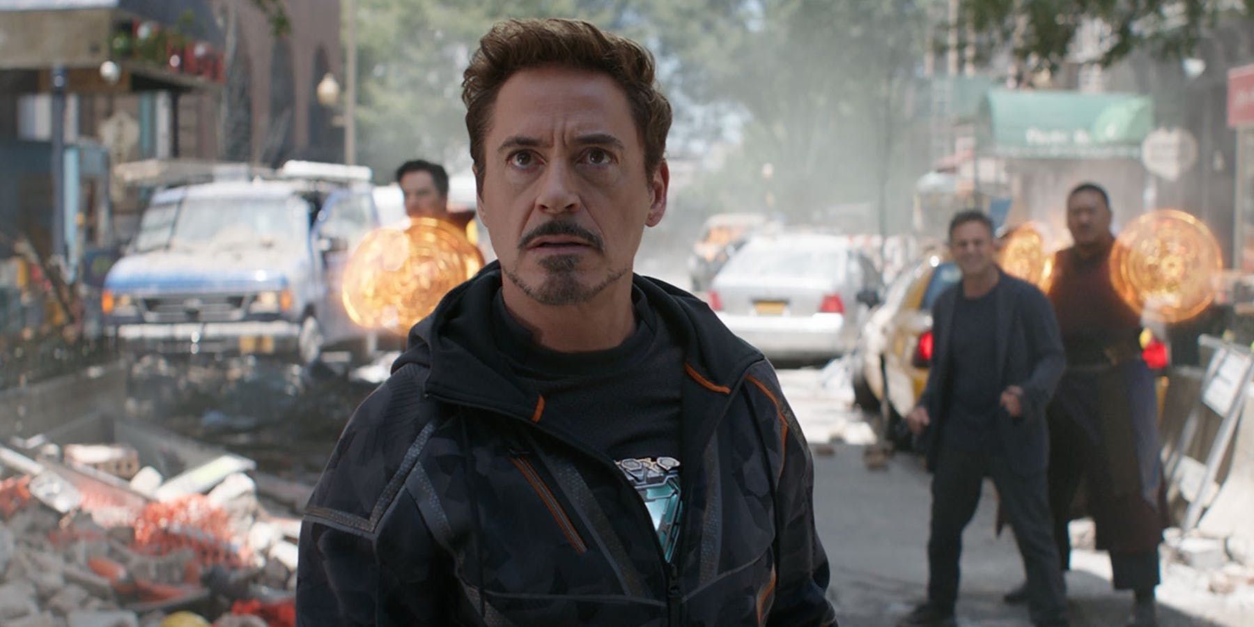 Iron Man looks on with Doctor Strange, Bruce Banner and Wong in the background in Infinity War