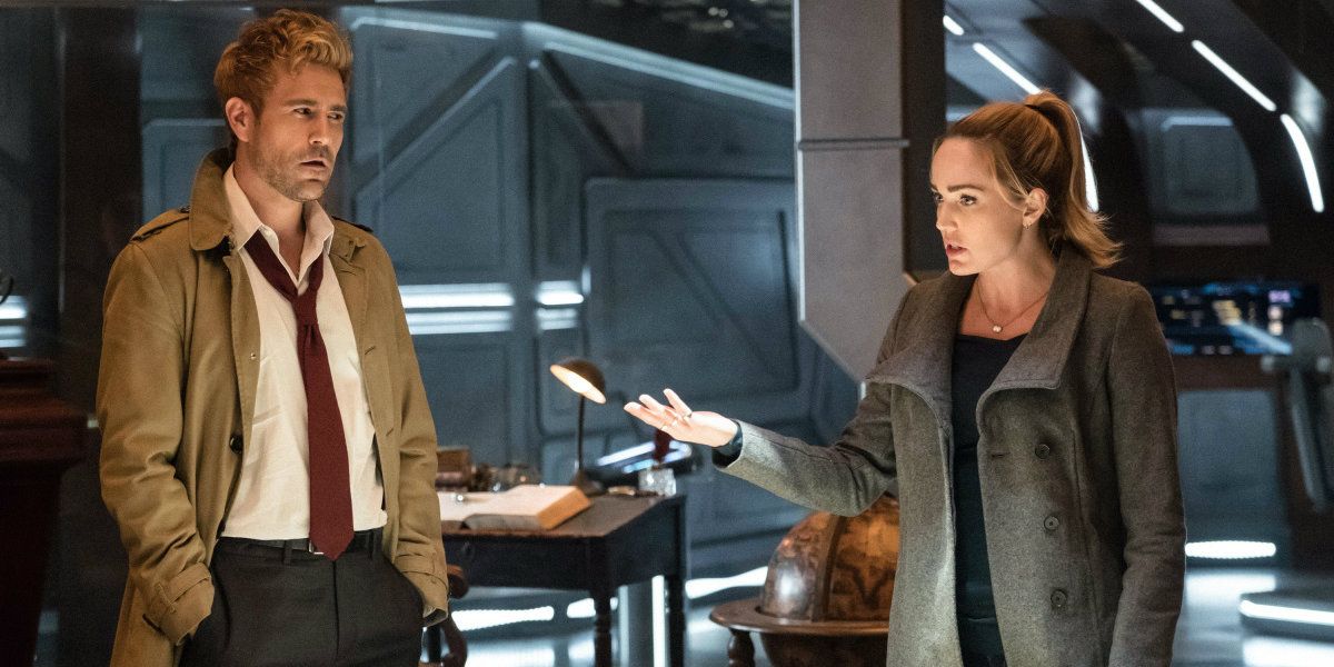 John Constantine in his trademark coat and Sara Lance in a grey coat on the Waverider