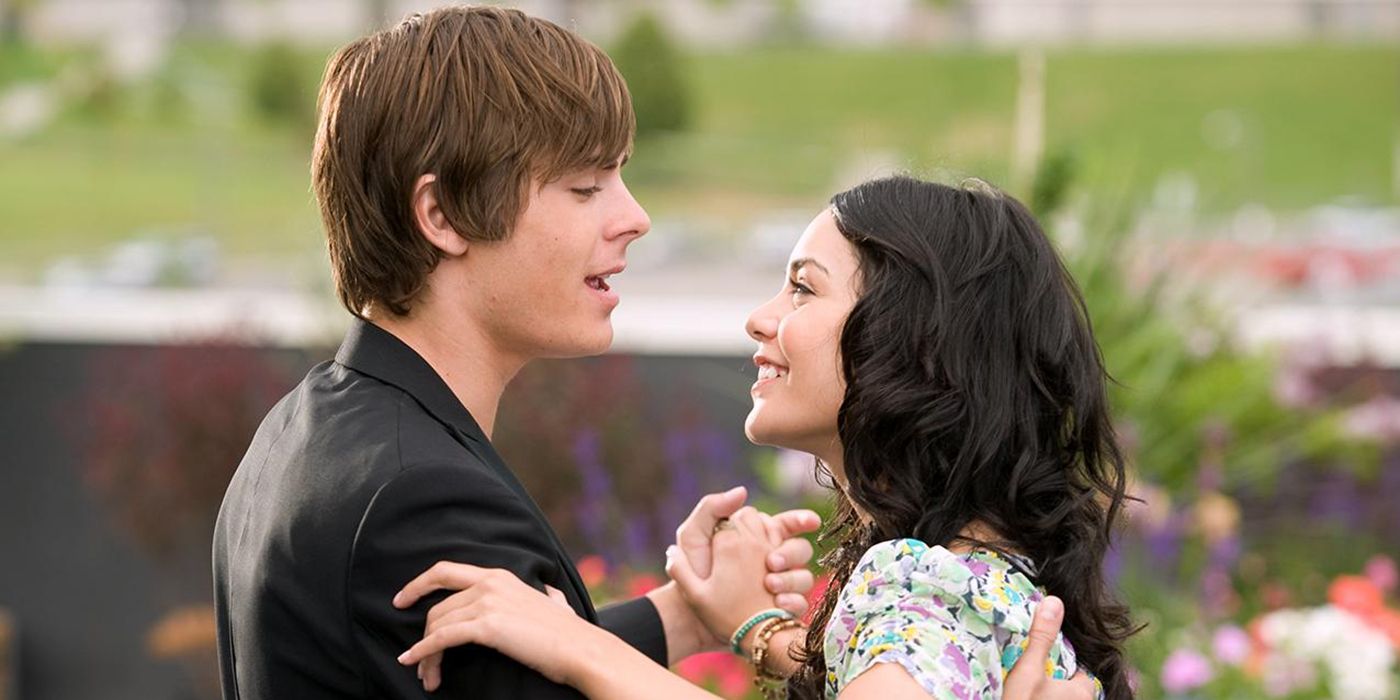 Troy (Zac Efron) and Gabriella (Vanessa Hudgens) dance on the roof to "Can I Have This Dance" in High School Musical 3.