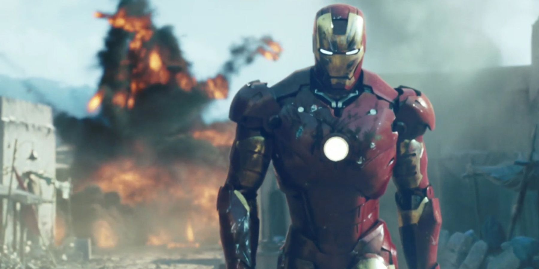 Iron Man walking away from an explosion in the MCU