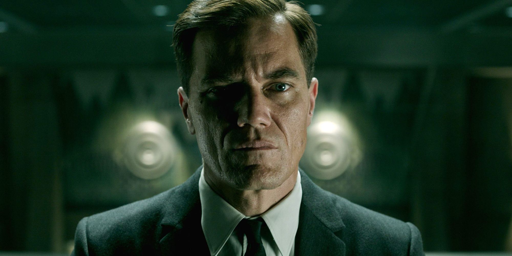 Michael Shannon stares ahead in The Shape of Water