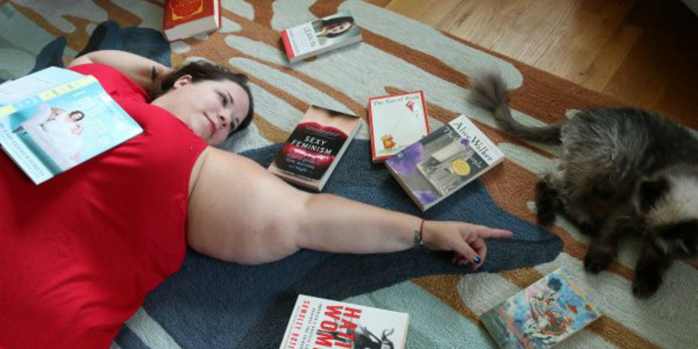 Whitney Way Thore with cat and books My Big Fat Fabulous Life