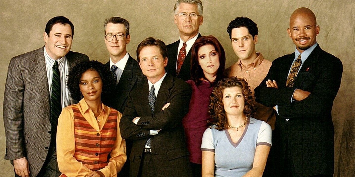 The cast of Spin City pose for a promotional image 