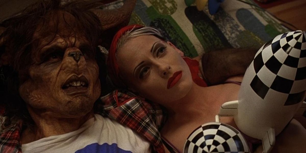 A controversial scene between Tank Girl and Booga in Tank Girl (1995)