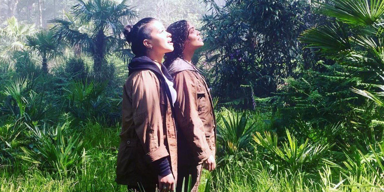 Gina Rodriguez and Tessa Thompson stand in The Shimmer in Annihilation