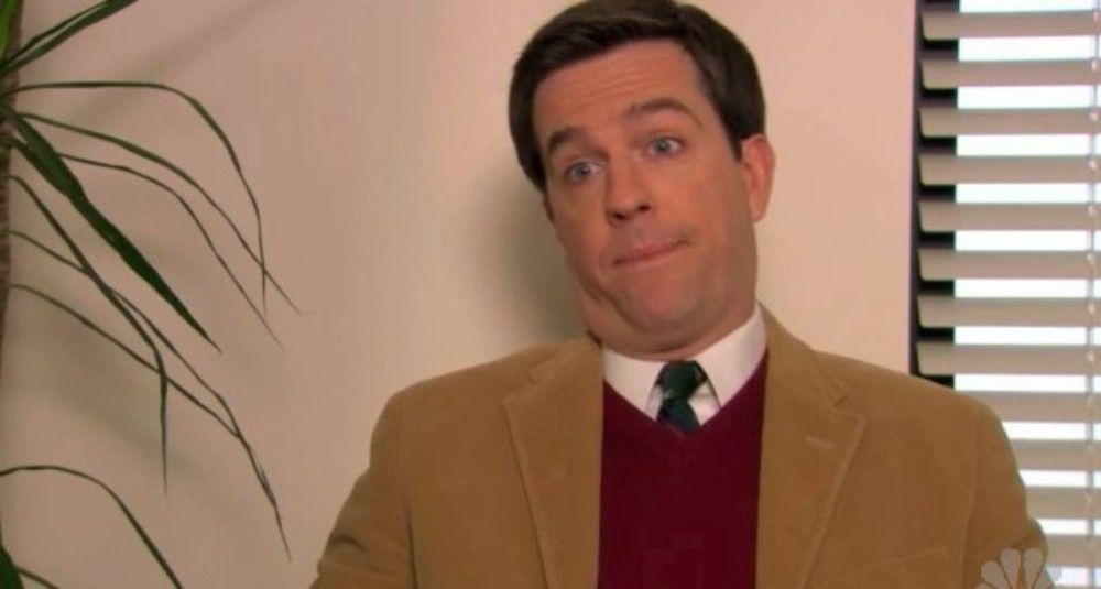 Andy Bernard from The Office sitting in front of the documentary camera crew for an interview 