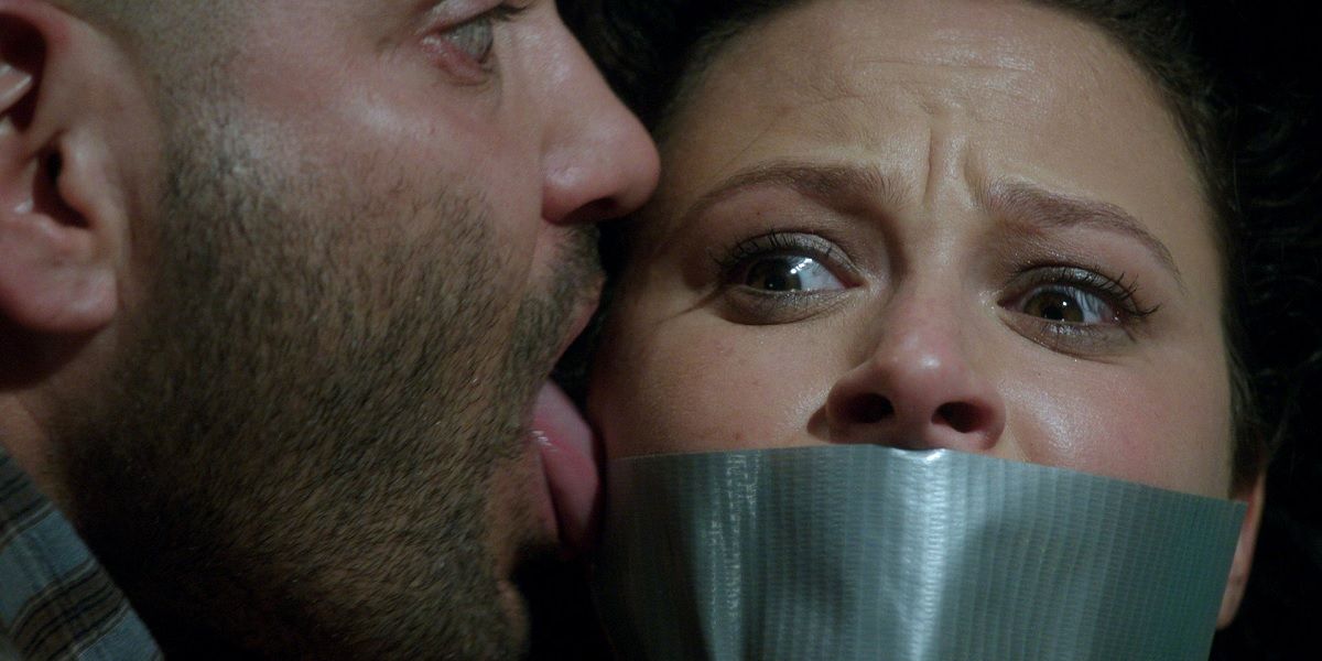 Huck licks Quinn's face while torturing her in Scandal