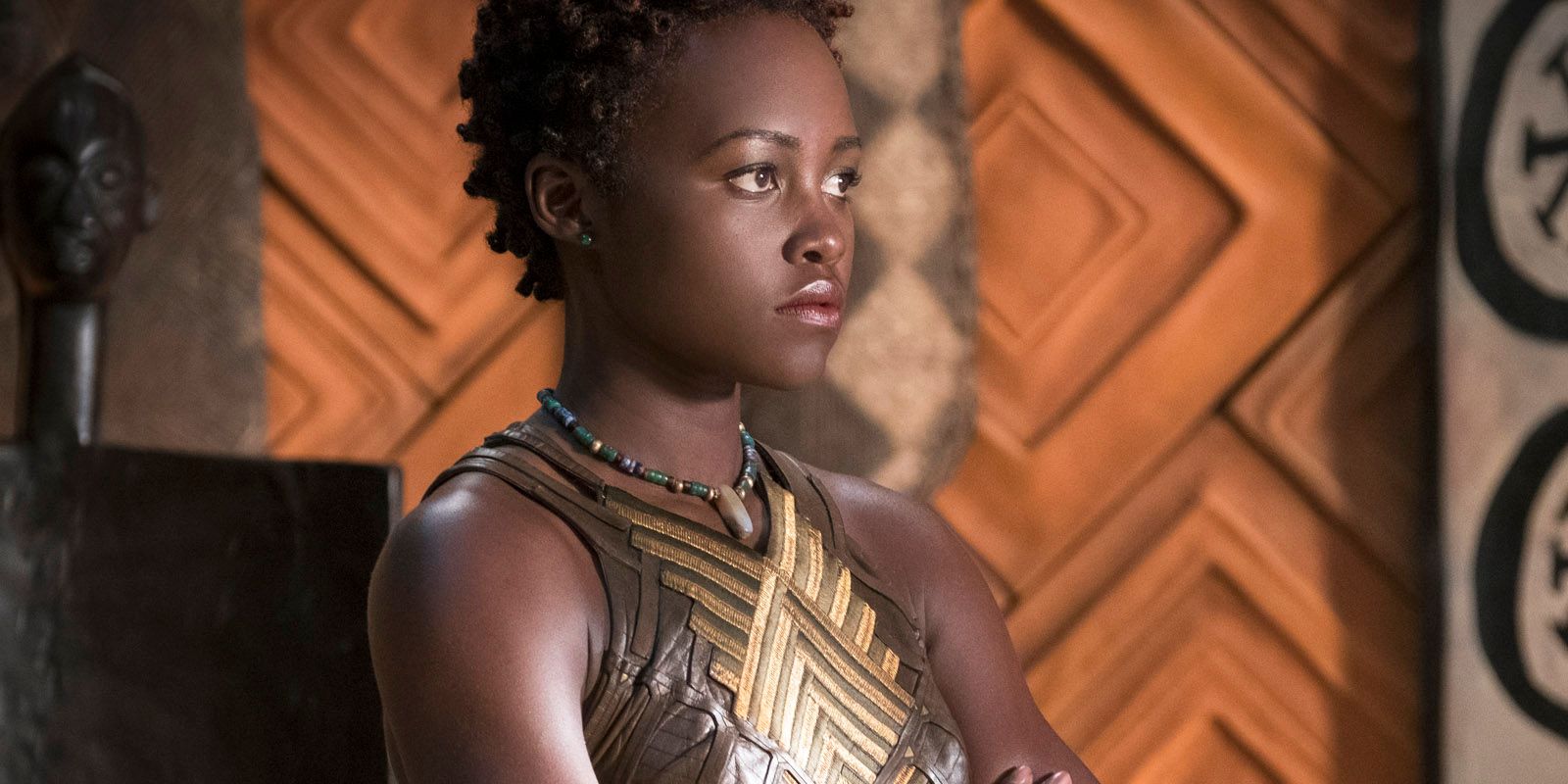 Nakia with her arms crossed in Black Panther