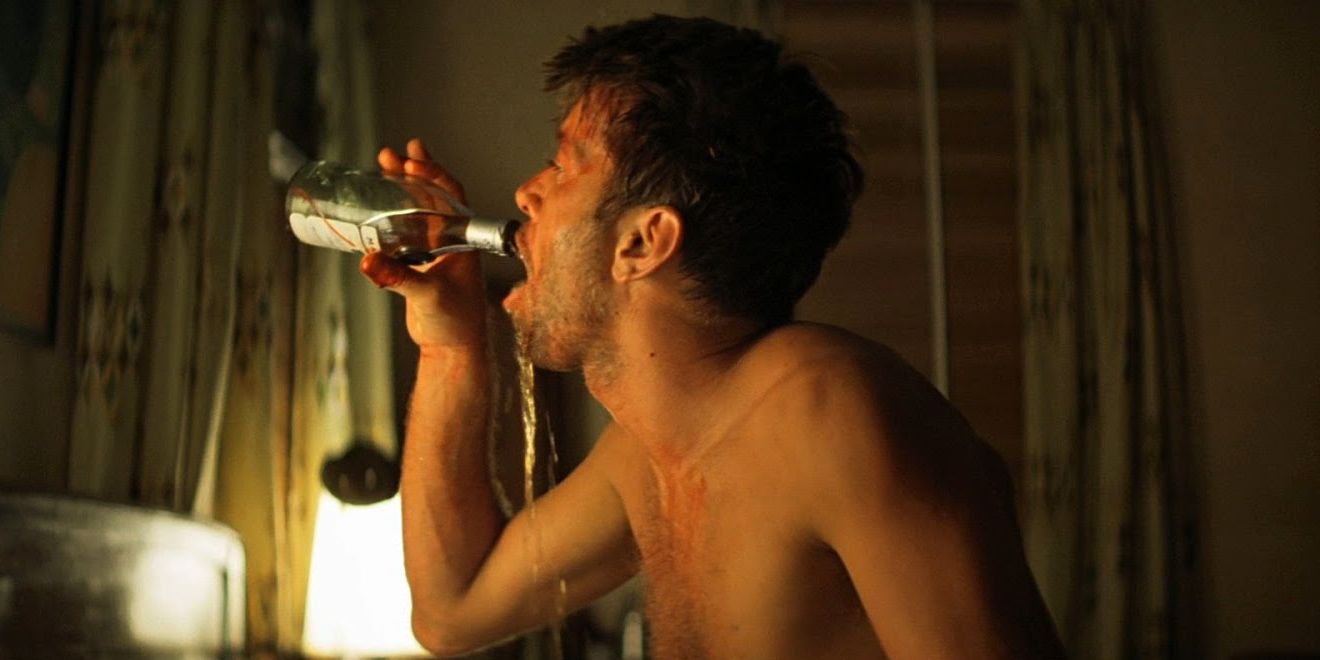 Willard drinking in a hotel in Apocalypse Now