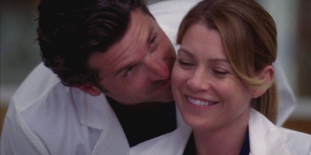 Derek e Meredith sorrindo em Grey's Anatomy
