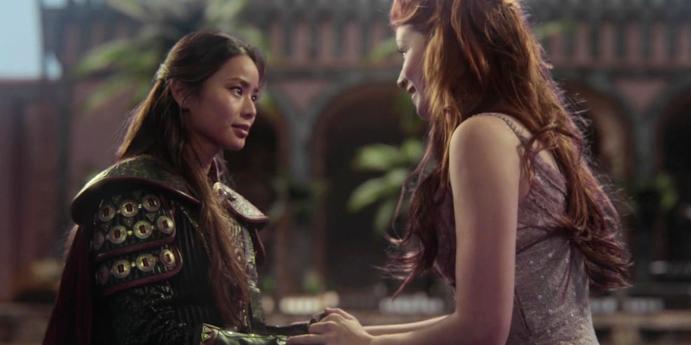 Mulan And Aurora in Once Upon a Time holding hands.