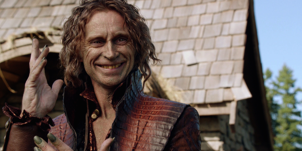 An image of Rumplestiltskin waving in Once Upon A Time