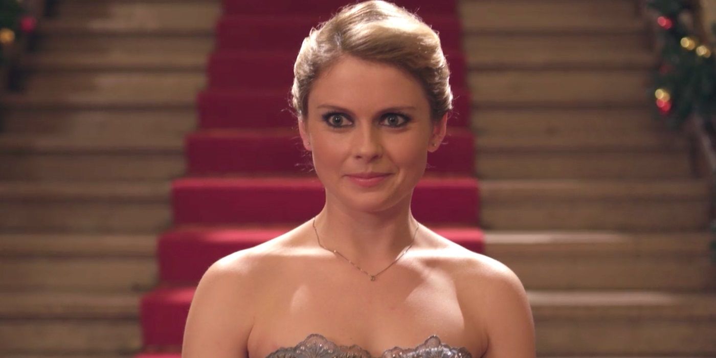 Rose McIver appears surprised on the steps in A Christmas Prince