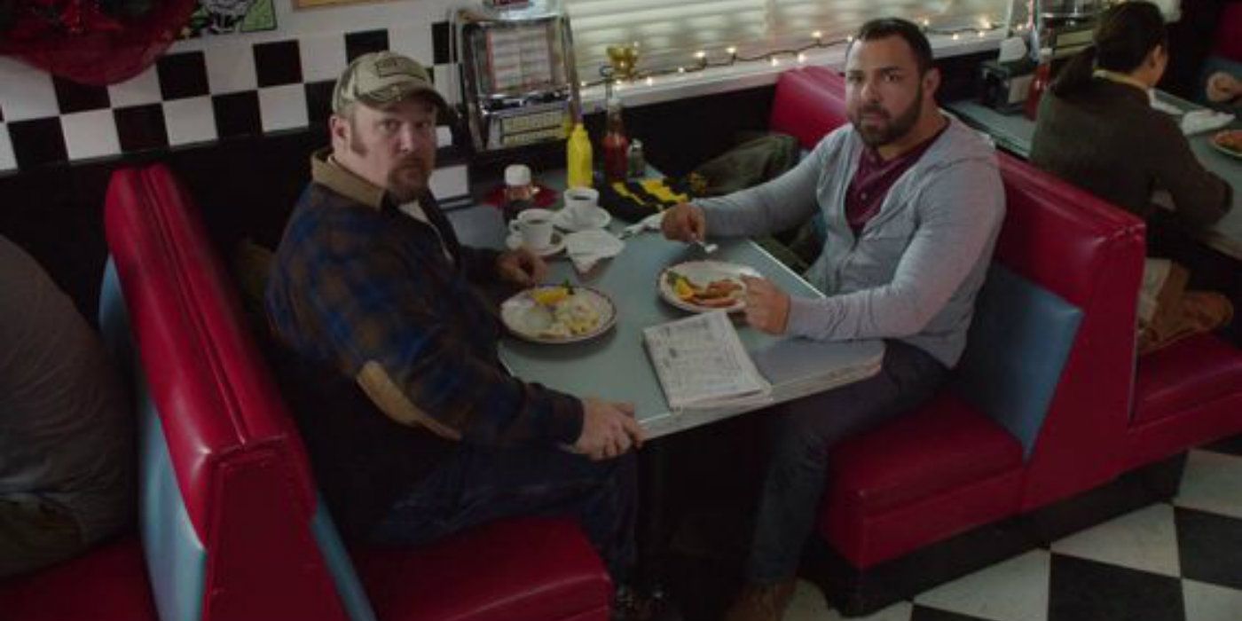 Larry the Cable Guy and Santino Marella sit in a diner in Jingle All The Way 2