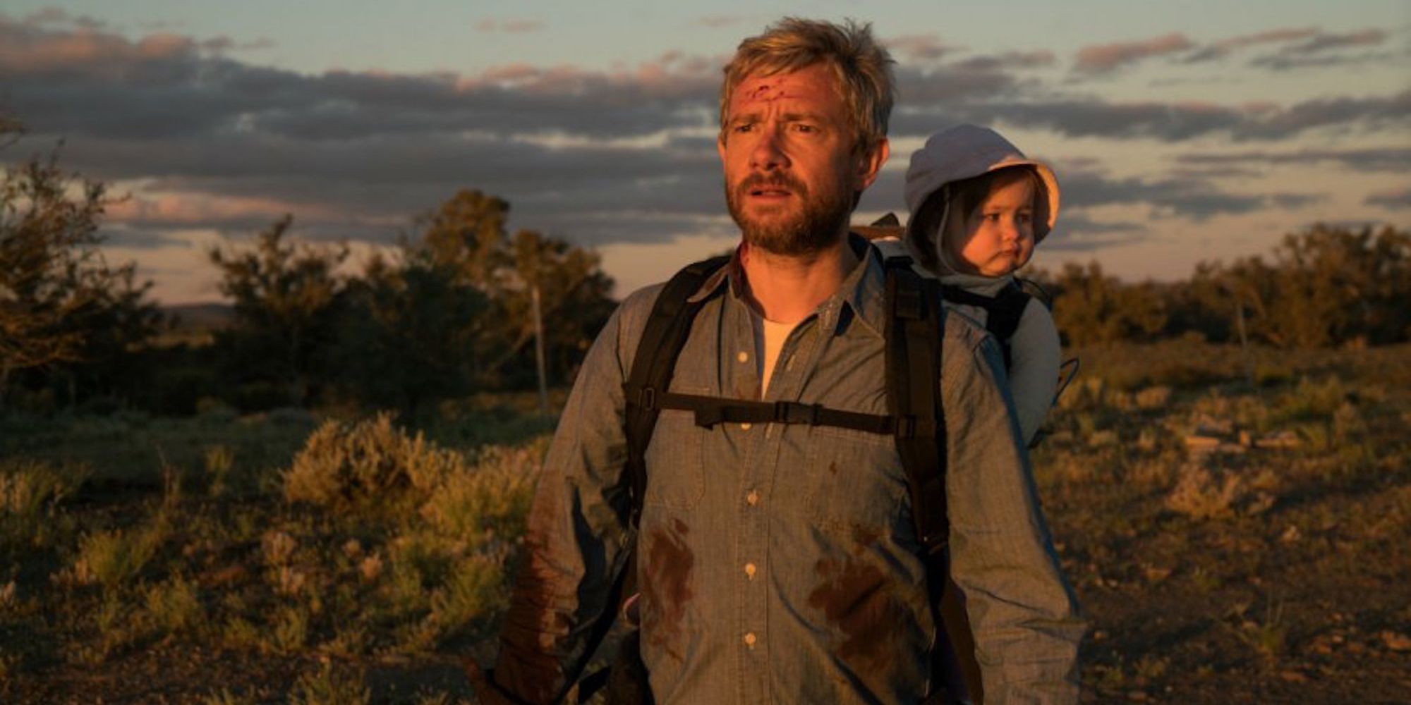 Martin Freeman in Cargo with the baby on his back