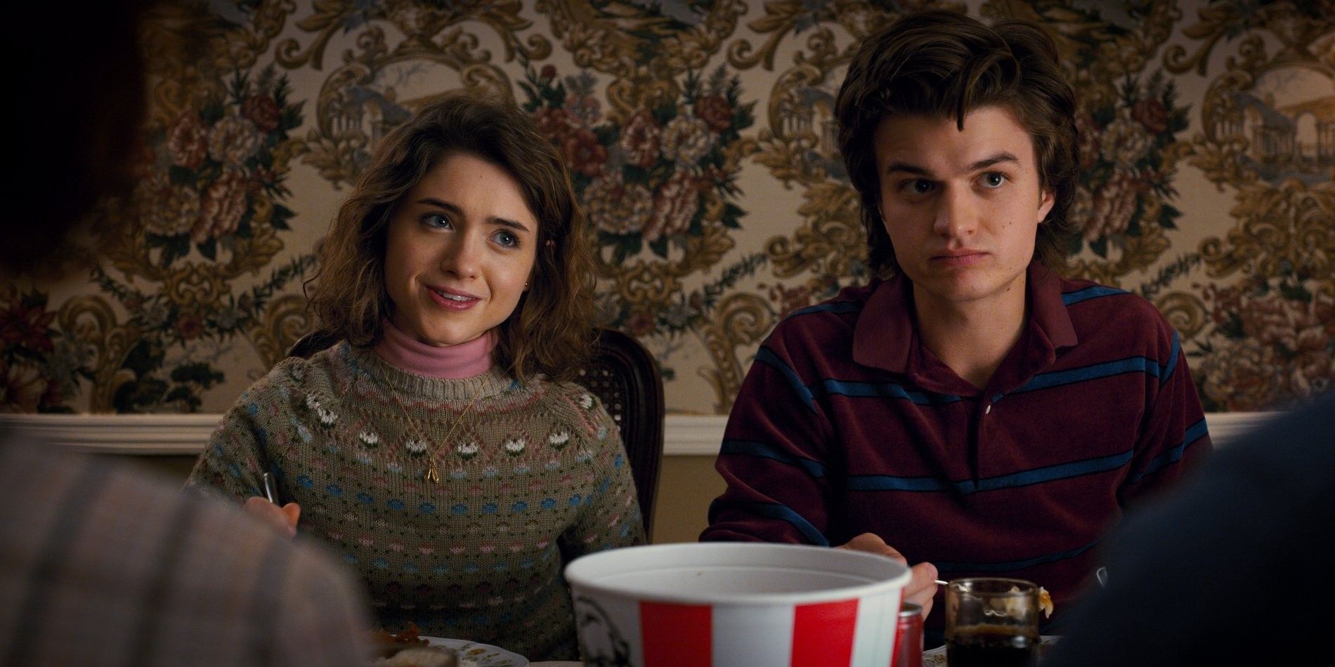 Natalia Dyer as Nancy and Joe Keery as Steve in Stranger Things