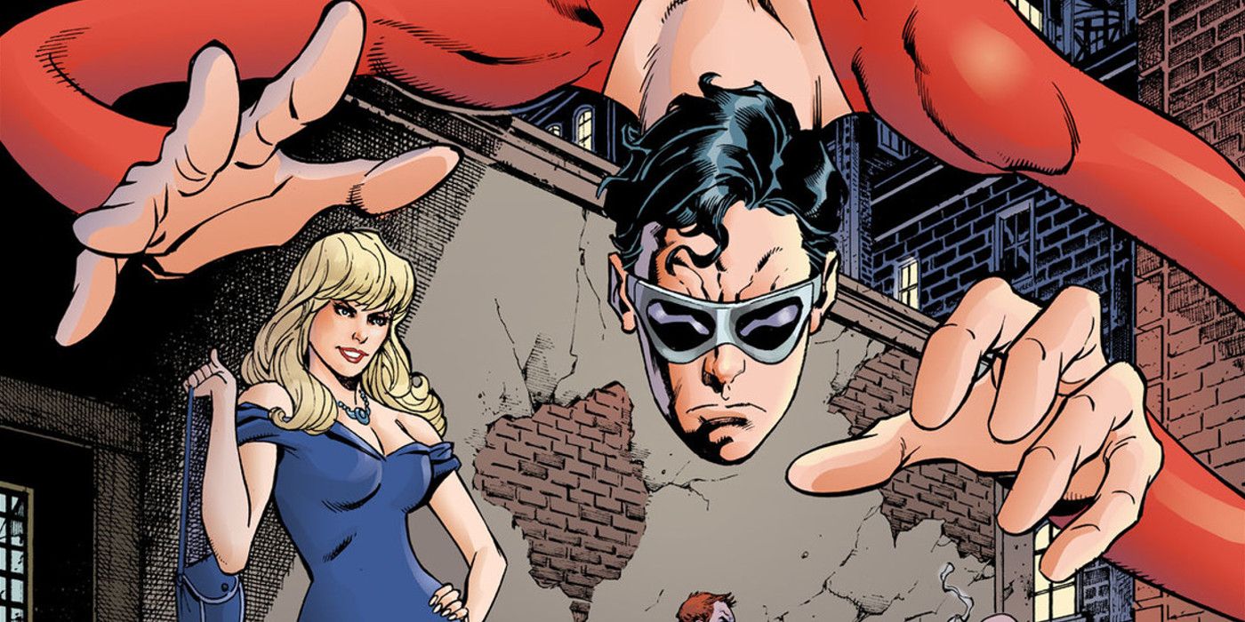 Plastic Man stretches over a building
