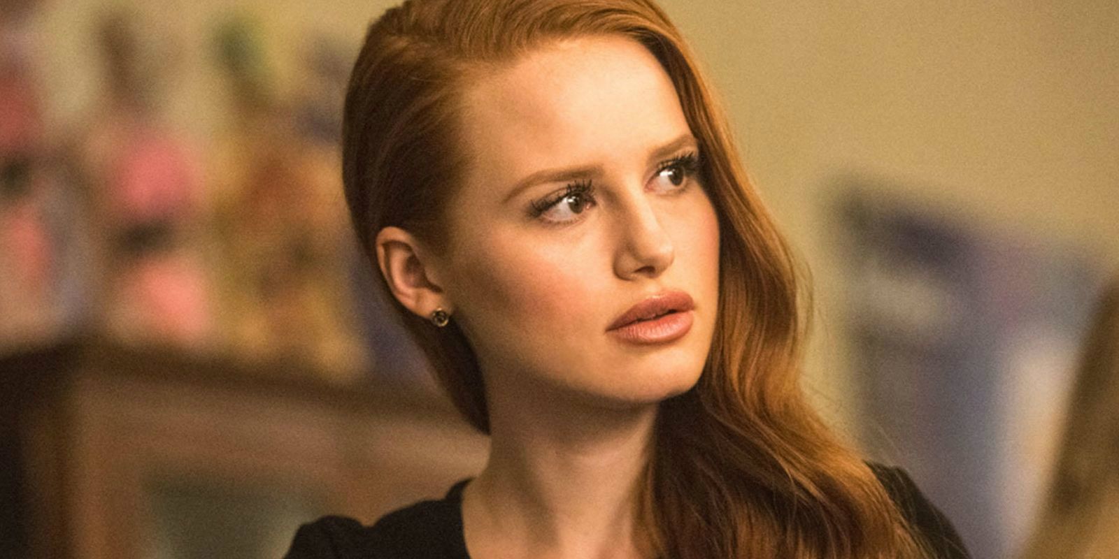 Cheryl Blossom looking at something beside her