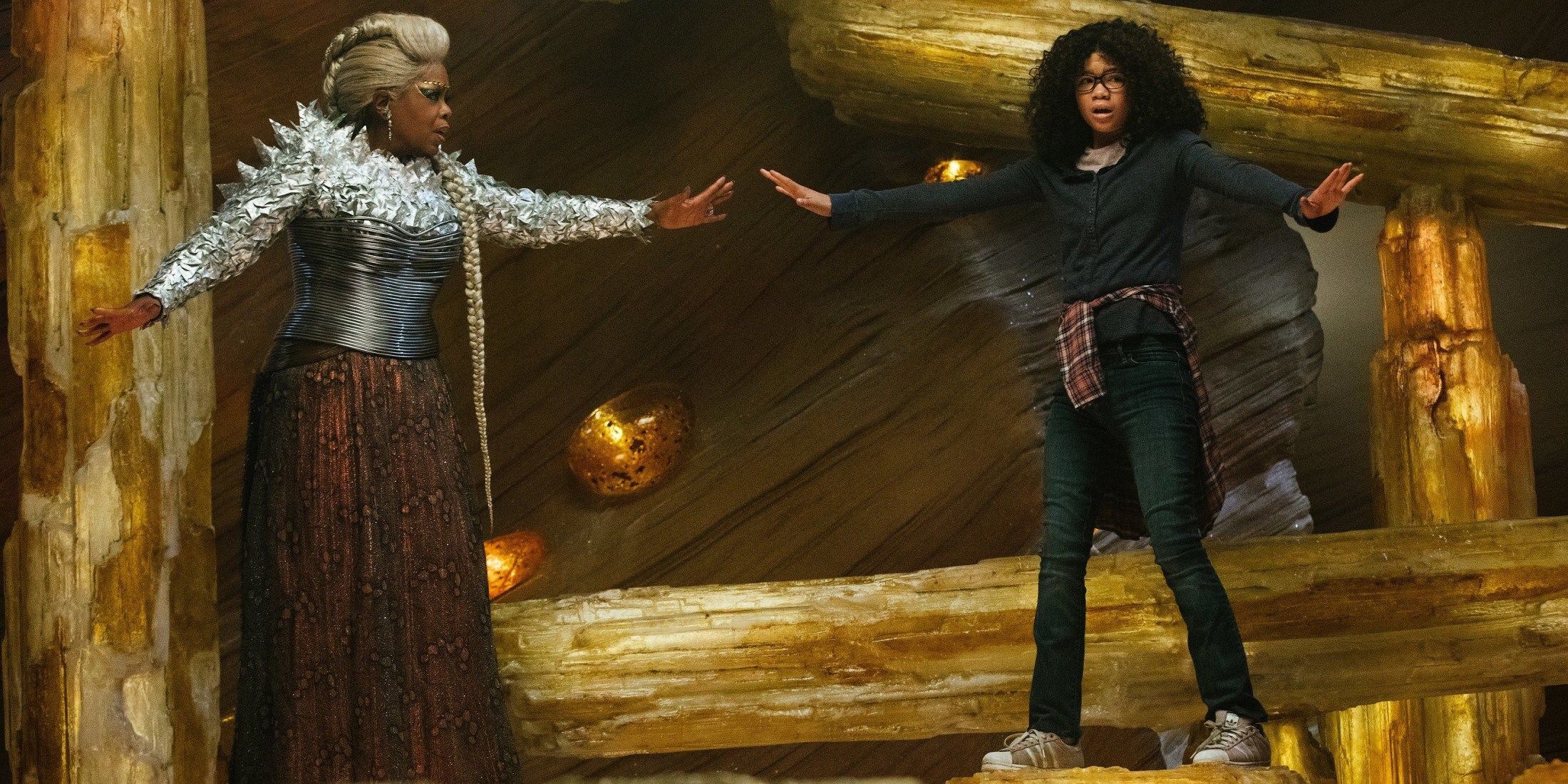 Storm Reid and Oprah Winfrey balancing in A Wrinkle in Time