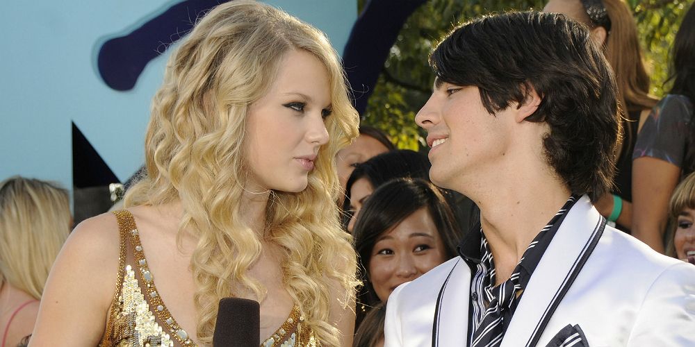 Taylor Swift and Joe Jonas look at each other in the eyes.