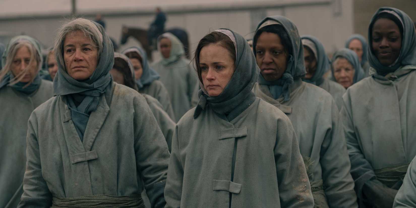 Alexis Bledel stands with a group of women in The Handmaid's Tale season 2