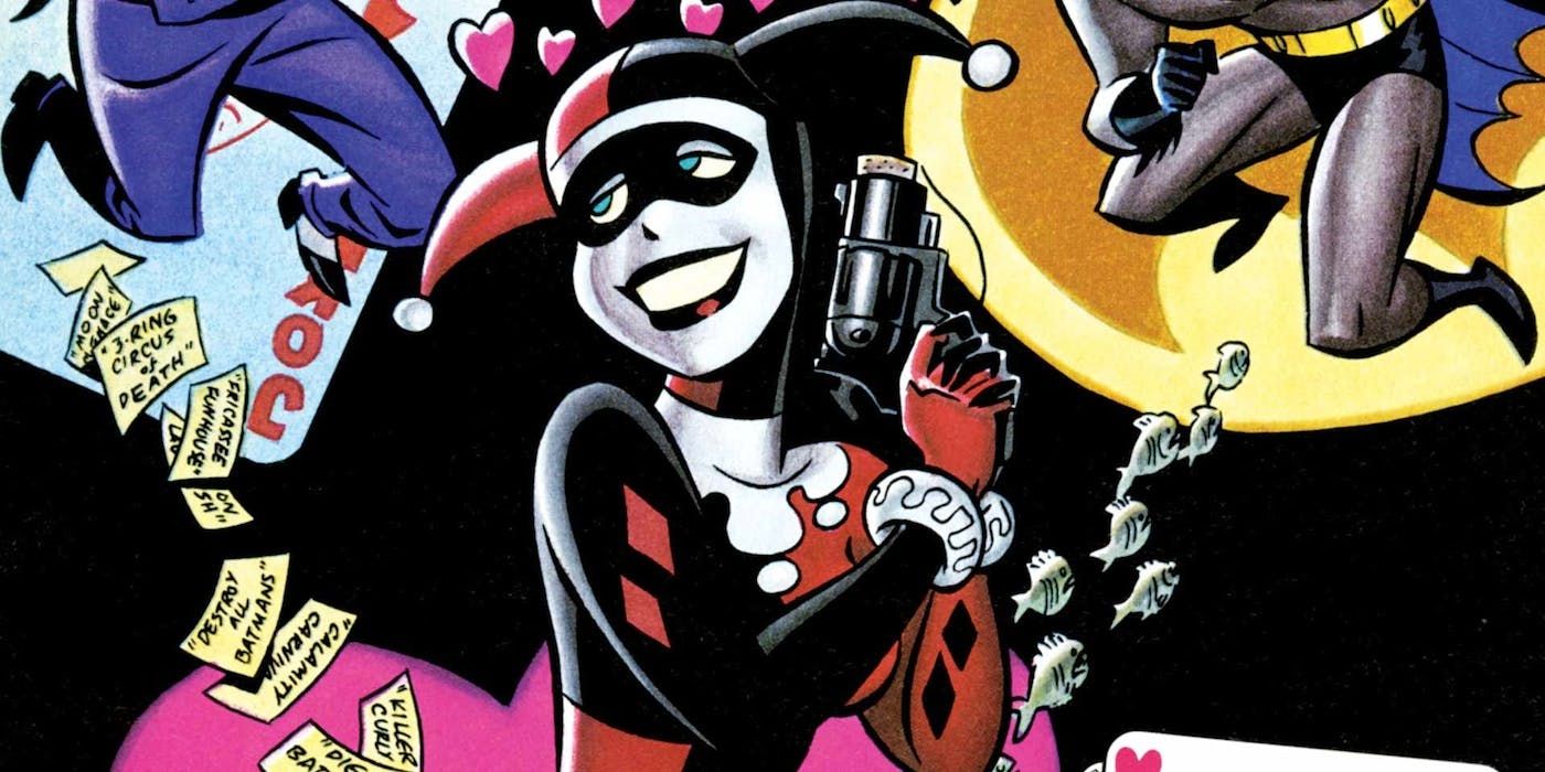 Harley Quinn holding a gun in the comics.