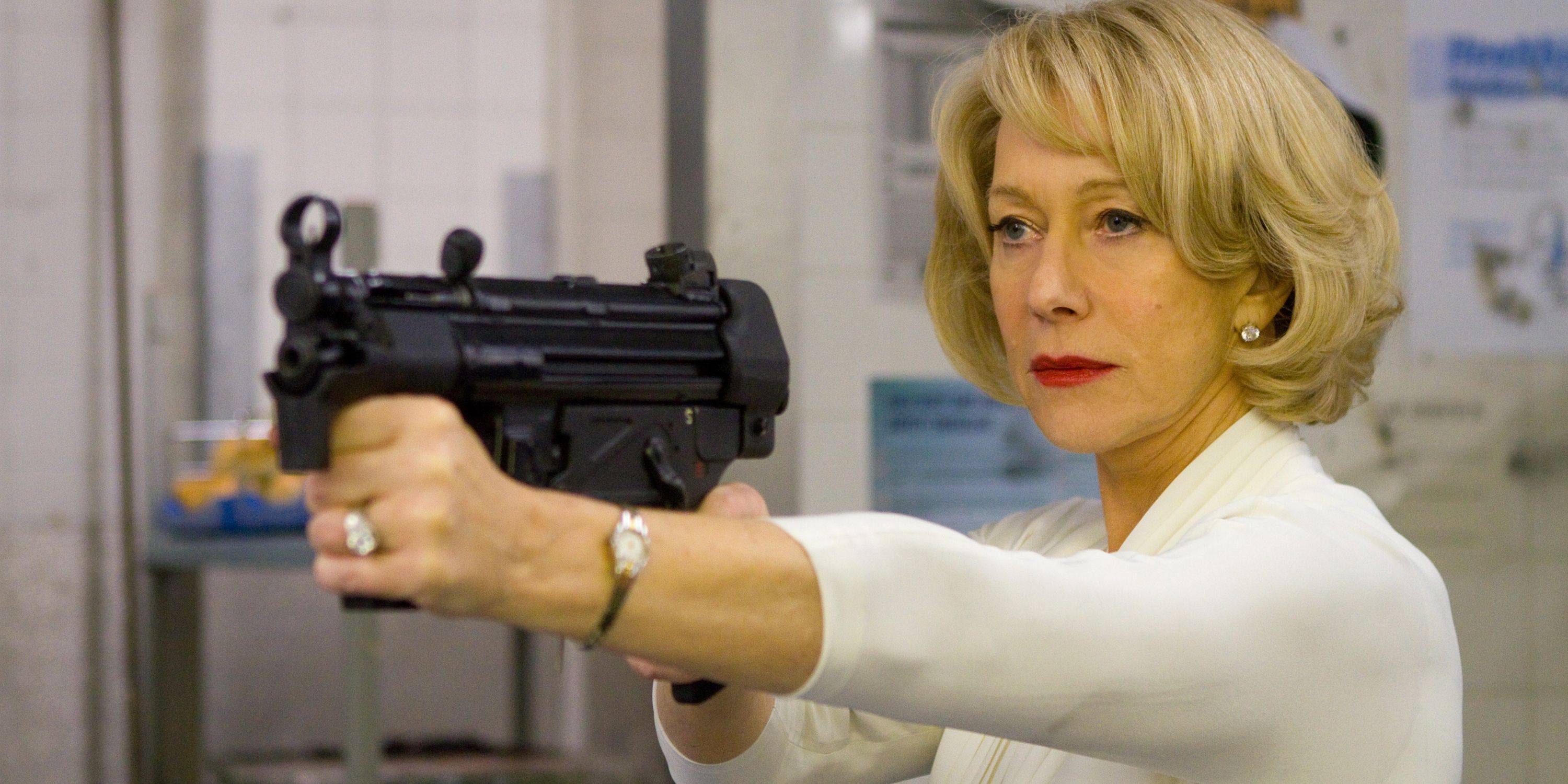 Helen Mirren firing a machine gun in Red