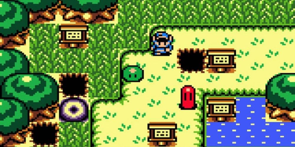 Link traversing the overworld in Link's Awakening with a couple of enemies nearby.