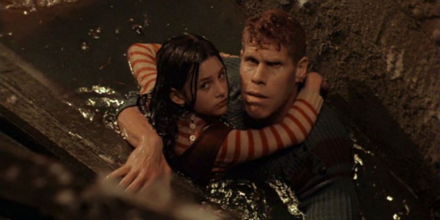 Ron Perlman saves a young girl in the City of Lost Children 