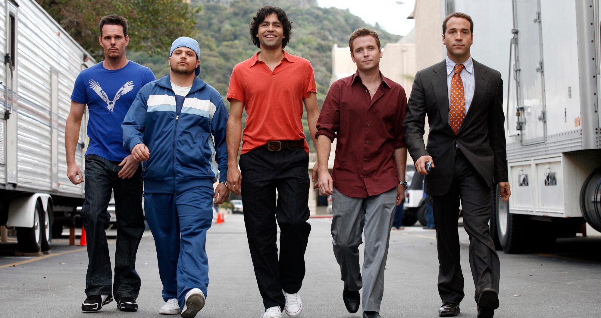 Entourage Cast walking together in a line on a studio backlot between trailers